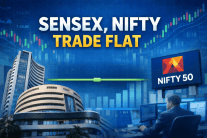 Sensex, Nifty trade flat with positive bias; IT index gains 1 pc