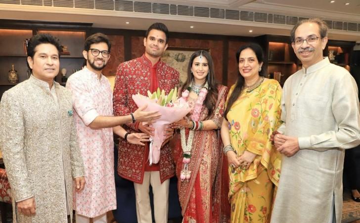 First wedding photo of Arjun Tendulkar–Saaniya Chandhok: couple twin in red bridal outfits; SRK, Gauri, Suhana, Mukesh Ambani–Nita, MS Dhoni–Sakshi bless the couple