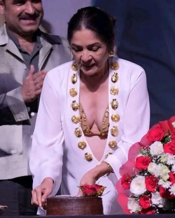 Is Neena Gupta pregnant at 66? Netizens think as actor caresses bump in white saree at Rashmika Mandanna–Vijay Deverakonda wedding reception