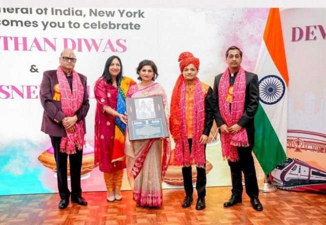 Dr Rekha Bhandari received rajasthan Ratna award on behalf of dr Rajendra Bansal of Florida Binay k Pradhan , prem bhandari raj Garg joint secretary Rana with spouse