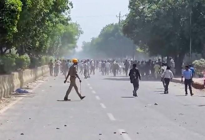 A massive protest by thousands of factory workers at the Hosiery Complex in Noida Phase 2 turned violent on Friday, April 10, resulting in significant property damage and clashes with security forces.