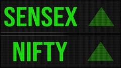 Sensex, Nifty end higher amid election results volatility