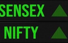 Sensex, Nifty end higher amid election results volatility