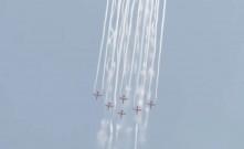 IAF Suryakiran aerobatics, green smoke trails; Chetak's flower shower mark Somnath Amrut Mahotsav