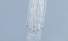 IAF Suryakiran aerobatics, green smoke trails; Chetak's flower shower mark Somnath Amrut Mahotsav