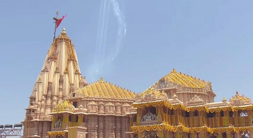 IAF Suryakiran aerobatics, green smoke trails; Chetak's flower shower mark Somnath Amrut Mahotsav