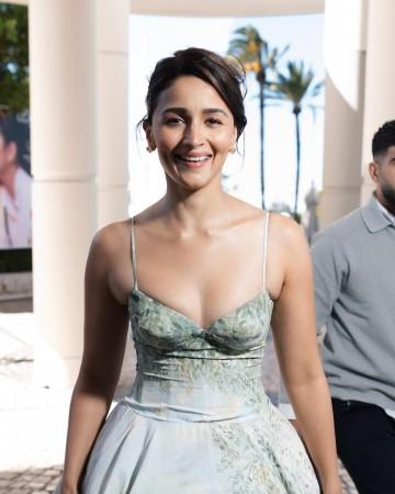 Cannes 2026: Alia Bhatt stuns in plunging neckline, dreamy mint-green gown; exudes Disney princess vibes, poses at French Riviera [Pics]