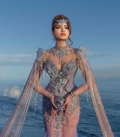 Urvashi Rautela trolled for silver outfit; Cannes team member asks her to move away as she waves on red carpet, fans call it embarrassing