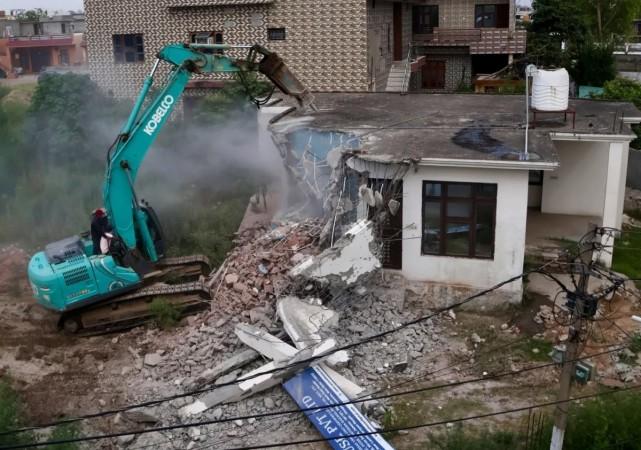House of a notorious drug trafficker demolished in Jammu Demolished property