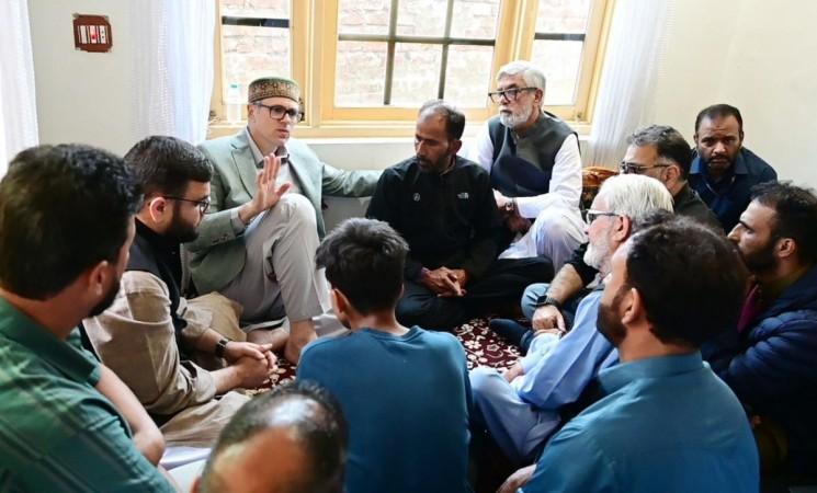J&K Chief Minister Omar Abdullah with victim's family members Omar Abdullah