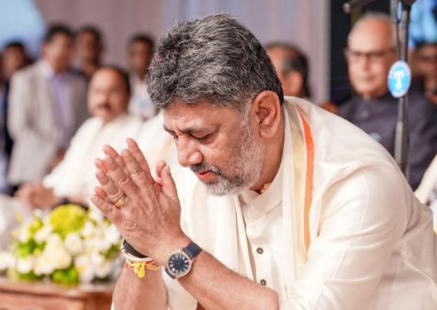 PM Modi Congratulates DK Shivakumar; Rahul Gandhi and DK hold hands, hug each other; a look at Grand Oath Ceremony