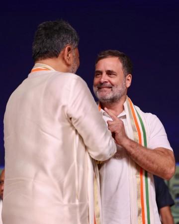 PM Modi Congratulates DK Shivakumar; Rahul Gandhi and DK hold hands, hug each other; a look at Grand Oath Ceremony