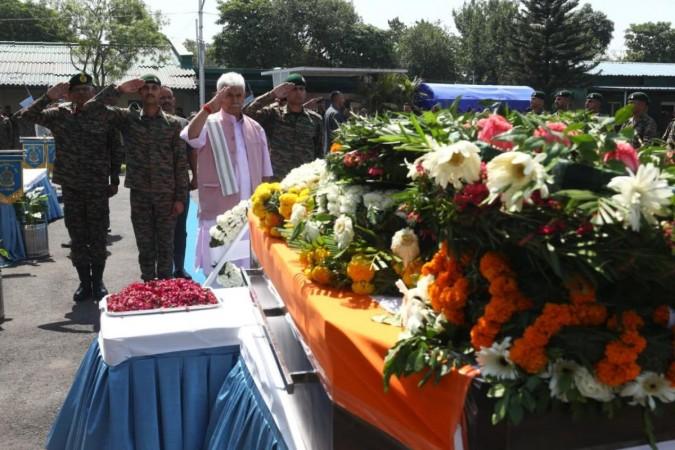 Jammu and Kashmir Lieutenant Governor Manoj Sinha paying homage to Lieutenant Beereshwar Goswami, who made the supreme sacrifice while undertaking a search operation during an anti-terror operation in Rajouri. LG Manoj Sinha