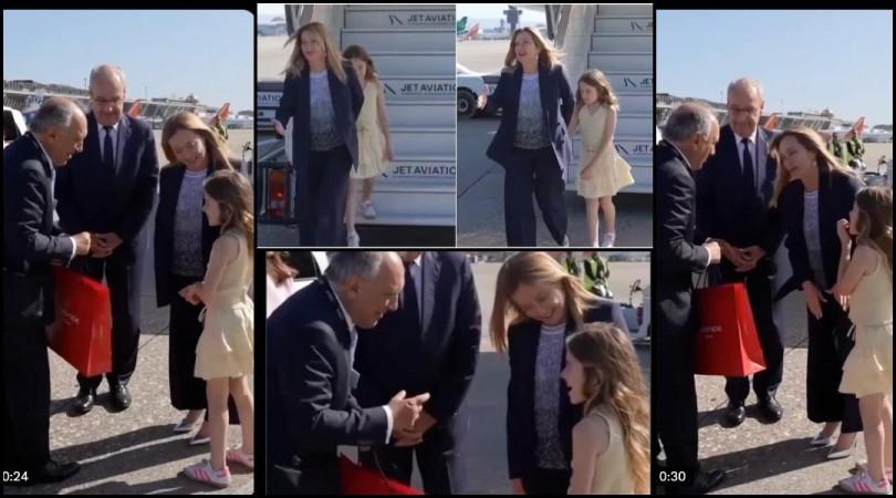 Italian PM Giorgia Meloni's daughter hides from flashing cameras at G7 Summit Italian PM Giorgia Meloni's daughter hides from flashing cameras at G7 Summit