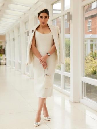 Sara Ali Khan exudes royalty in ivory plunging-neckline outfit; poses with Superman star Henry Cavill at Longines event