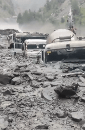 A view of vehicles buried in debris after a flash flood wreaked havoc in Doda district. Thathri
