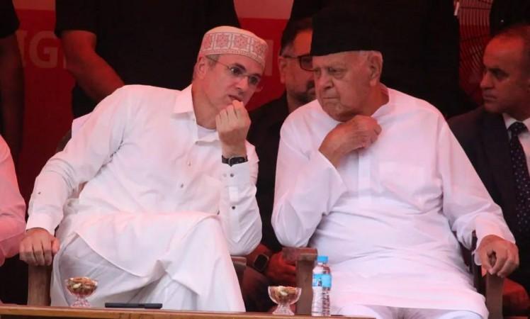 J&K Chief Minister Omar Abdullah with National Conference president Dr Farooq Abdullah during a rally at Srinagar Faroq-Omar