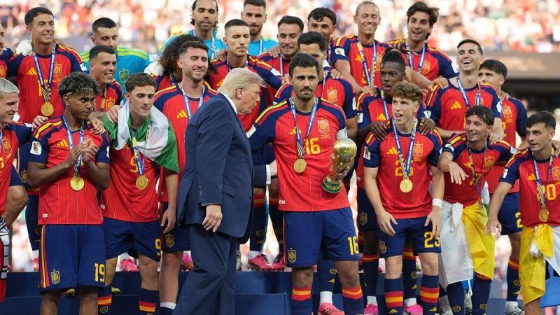 Donald Trump refuses to leave podium in awkward moment as Spain lift World Cup