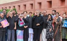 Oppn MPs in black protest outside Parliament House over NEET paper leak, police cruelty