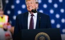 Trump defends tariffs as economic boost, says Iran wants deal but won't get nuclear weapon
