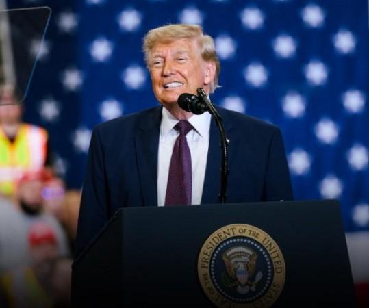 Trump defends tariffs as economic boost, says Iran wants deal but won't get nuclear weapon