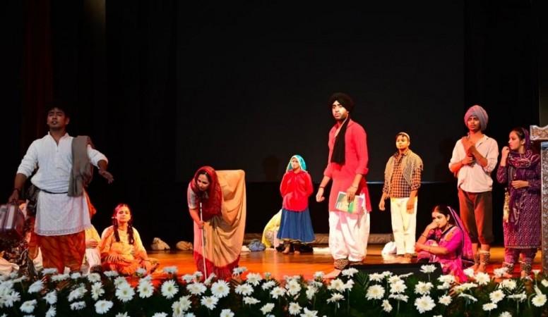 Artists performing during a play to highlight plight of victims of partition Partition