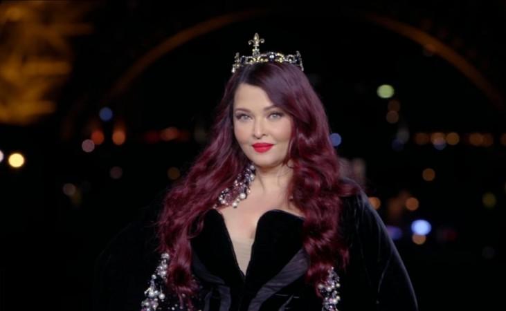 Aishwarya Rai Bachchan fat- and age-shamed for body-hugging black velvet dress, flaunts red hair, wears tiara at PFW runway; fans say 'she looks huge' Aishwarya Rai Bachchan fat- and age-shamed for body-hugging black velvet dress, flaunts red hair, wears tiara at PFW runway; fans say 'she looks huge'