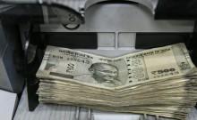 Rupee falls 22 paise to 96.57 against US dollar after RBI repo rate hike; Sanjay Malhotra says currency is undervalued