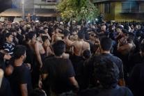 Shiite Muslim mourners beat their chest during a flagellation ritual