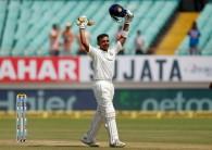 The debutant brings up his maiden Test half-century from 56 balls