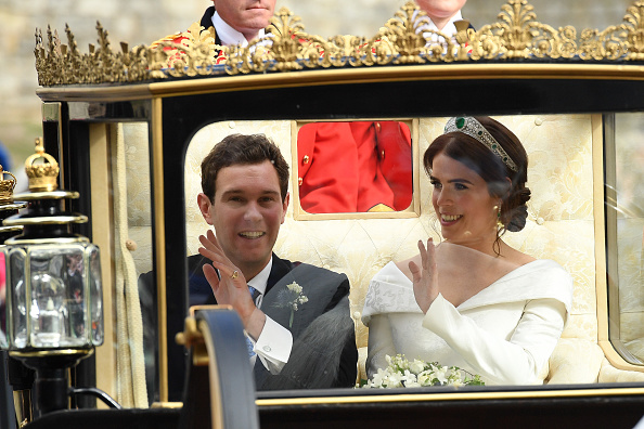 Princess Eugenie and Jack Brooksbank wave to the crowds Princess Eugenie marries Jack Brooksbank,Princess Eugenie weds Jack Brooksbank,Princess Eugenie wedding,Princess Eugenie wedding pics,Princess Eugenie wedding images,Jack Brooksbank wedding,Jack Brooksbank wedding pics,Jack Brooksbank wedding images
