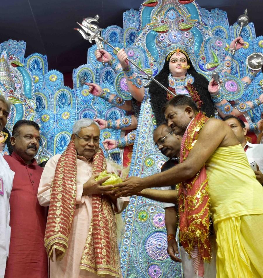 CM Nitish Kumar performs 'aarti' at Chhoti Patan Devi Temple on 'Maha Navami' Nitish Kumar,CM Nitish Kumar,Nitish Kumar at Chhoti Patan Devi Temple,Chhoti Patan Devi Temple,Maha Navami,Nitish Kumar performs aarti,Maha Navami celebration,Maha Navami celebration pics,Maha Navami celebration images,Maha Navami celebration stills
