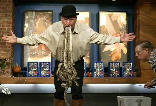 25. Most rattlesnakes held in mouth by their tails