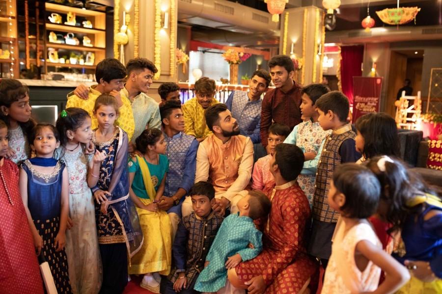 Virat Kohli celebrates diwali with Dharavi kids Virat Kohli,Virat Kohli celebrates diwali,diwali,diwali celebration,diwali celebration pics,diwali celebration images,virat kohli anushka sharma,Dharavi Reloaded