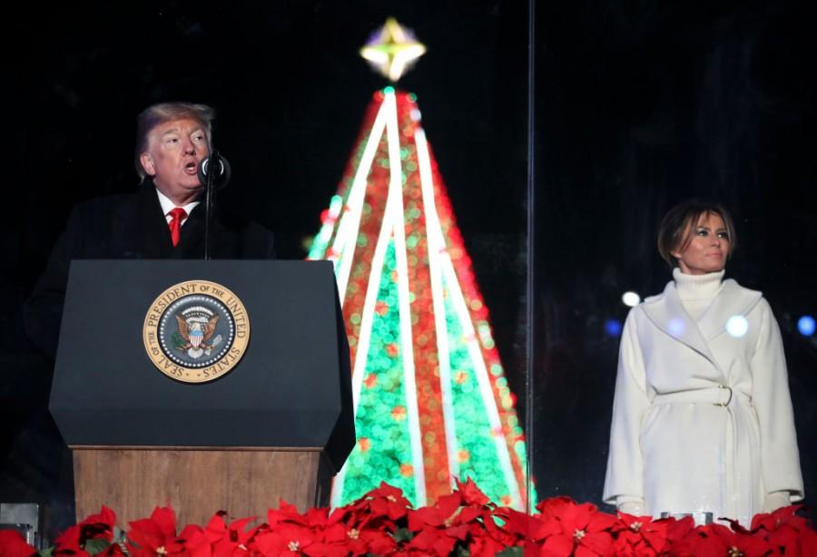 U.S. President Donald Trump lights up the tree at National Christmas