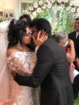 Peter Paul Kisses Vanitha Vijayakumar at their Wedding