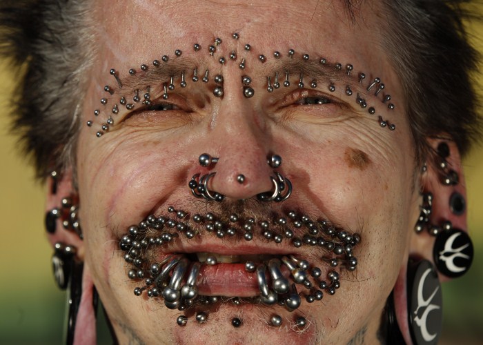 Guinness World Record holder for the 'Most Pierced Man', Rolf Bucholz of Germany Weird World Records,World Records,Guinness record,Guinness record 2014,Guinness record 2015,world records list,world records 2013,world records human body,amazing world records,world records dance,easy world records to break