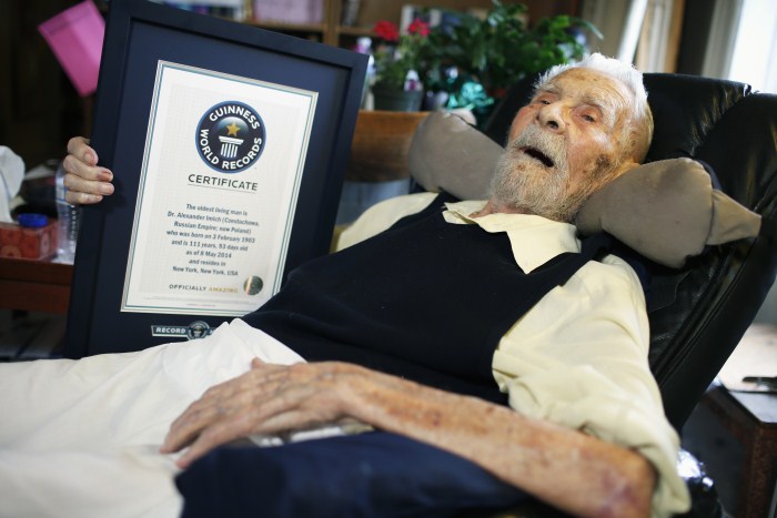 111-year-old Alexander Imich holds a Guinness World Records certificate recognizing him as the world's oldest living man Weird World Records,World Records,Guinness record,Guinness record 2014,Guinness record 2015,world records list,world records 2013,world records human body,amazing world records,world records dance,easy world records to break