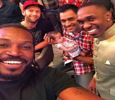 Gayle and Bravo Selfie with Dhoni's daughter Ziva