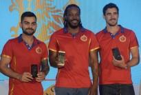 Virat Kohli, Chris Gayle and AB de Villiers during the launch of Huawei Honor Mobile Phones