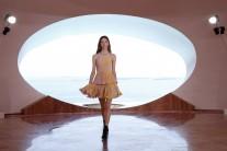 A model presents a creation by Belgian designer Raf Simons for Dior's women CRUISE 2016 collection during a fashion show