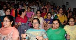 Members of Amritsar District Nursing Association take part in a candle light vigil to mark the World Nursing Day in Amritsar on 12 May 2015.