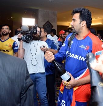 Delhi Daredevils player Zaheer Khan celebrates team's victory against Chennai Super Kings at a Raipur hotel on 12 May 2015.