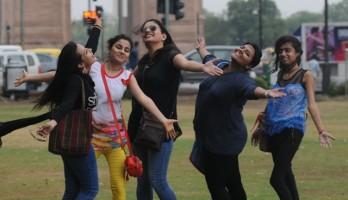 New delhi,rain in new delhi,new delhi rains,rain photos,delhi rain photos