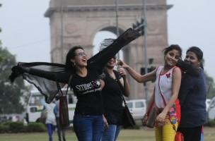 New delhi,rain in new delhi,new delhi rains,rain photos,delhi rain photos