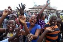 Crowds pour onto the streets of Burundi's capital to celebrate after a general said he was dismissing President Pierre Nkurunziza for violating the constitution by seeking a third term in office