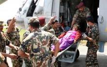 Casualties brought from Lamabagar to Kathmandu by an Indian Air Force (IAF) Mi-17 V5, being received by the Indian Paramedical team in Nepal.