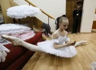 A student of the Krasnoyarsk choreographic college prepares backstage before a dress rehearsal of a performance by graduates of the college at the State Theatre