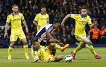 ohn Terry fouls West Brom's Saido Berahino resulting in a penalty Action