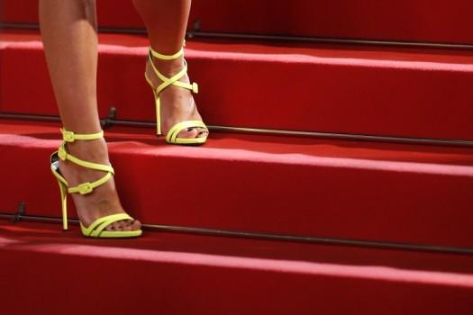 The shoes of an unidentified guest are pictured as she pose on the red carpet